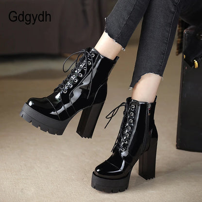 Botas altas de stripper góticas