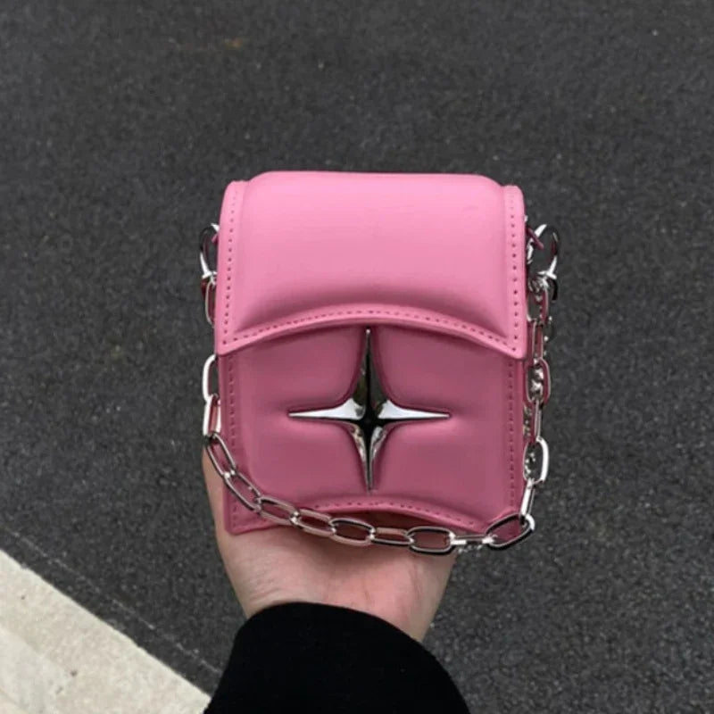 Bolso con cadena y cruz - rosa