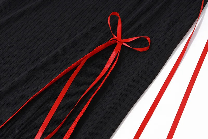 Vestido negro con lazo.