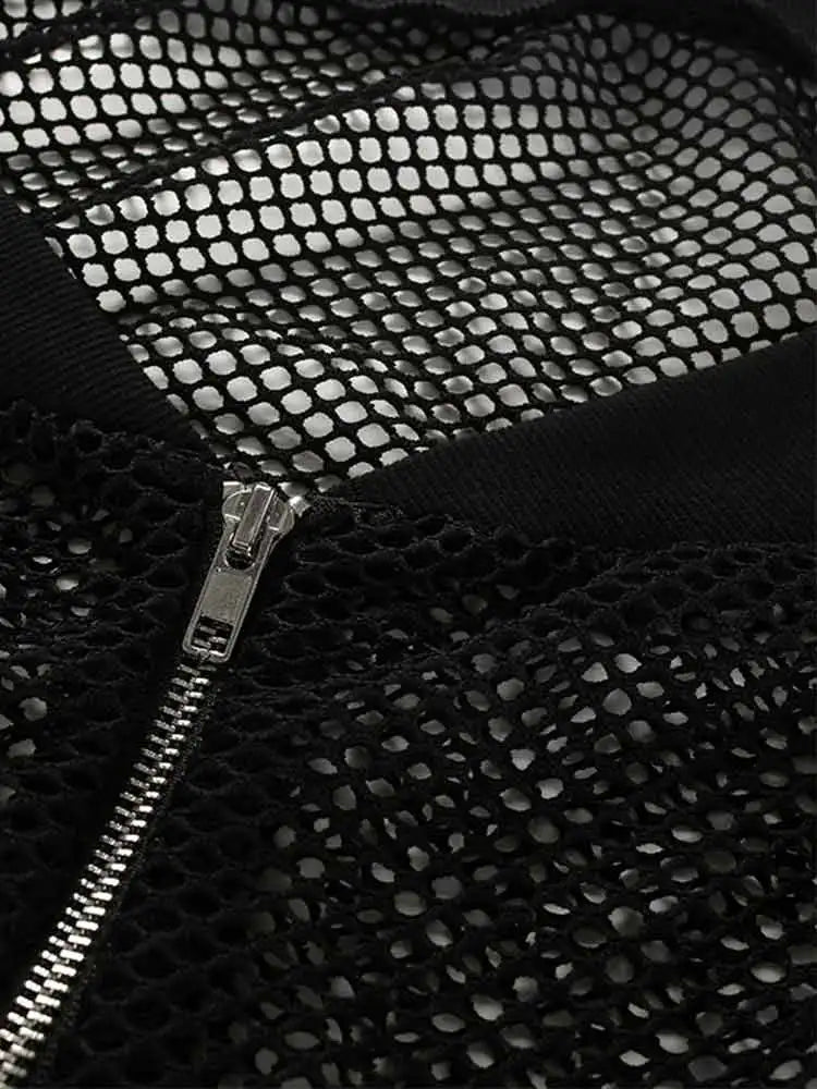 Top corto punk con mangas largas